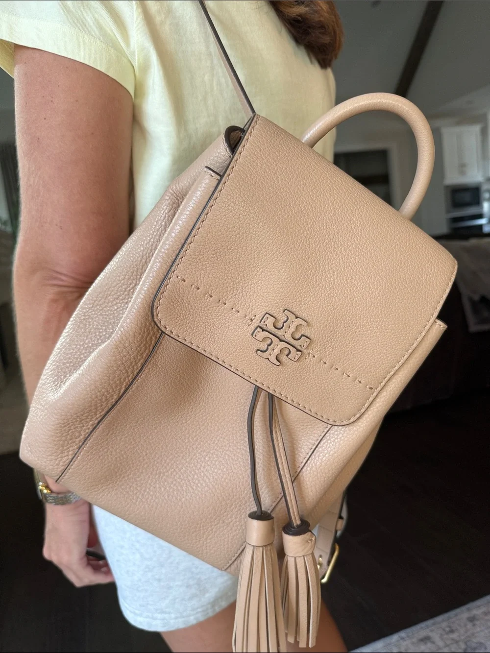 Tory Burch Pebbled Leather Tassel Backpack in Light Beige